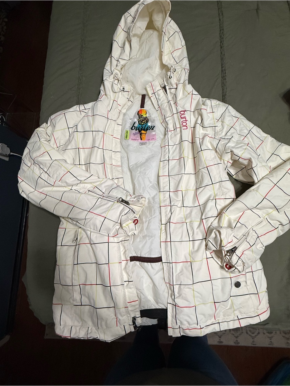 Burton White Hooded womens ski Jacket with Red, Yellow & Blue Grid